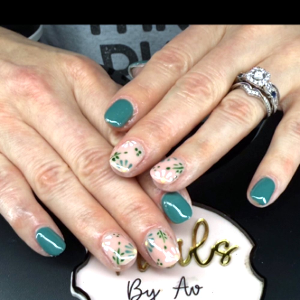 Green structure gel nails with hand-painted art by Ava